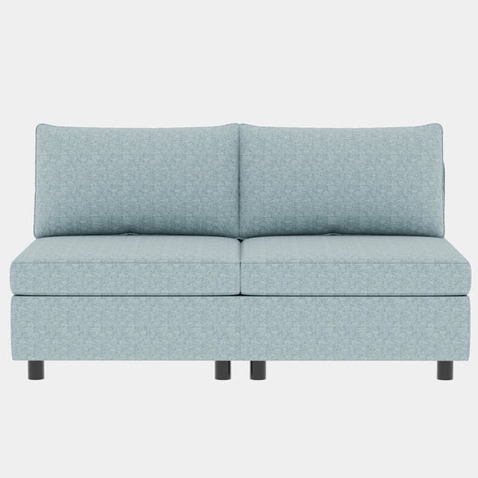 Modern light blue upholstered sofa with plush cushions and dark legs