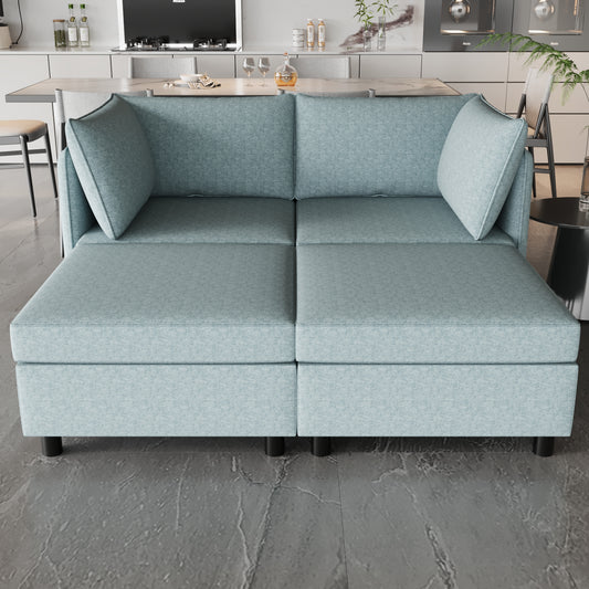 Light blue upholstered sectional sofa with plush cushions and black legs perfect for modern living rooms