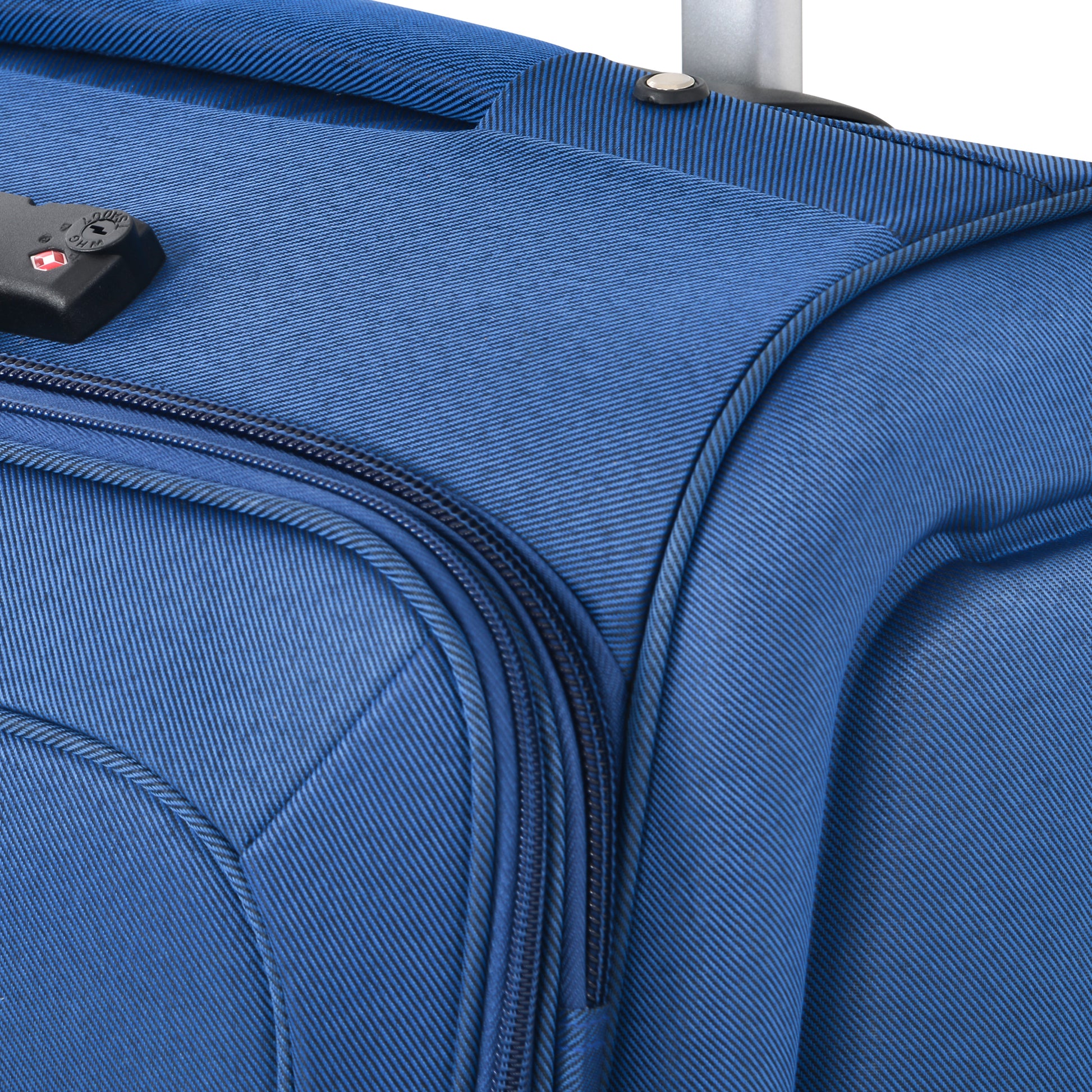 Closeup of blue textured fabric luggage with TSA lock and zipper