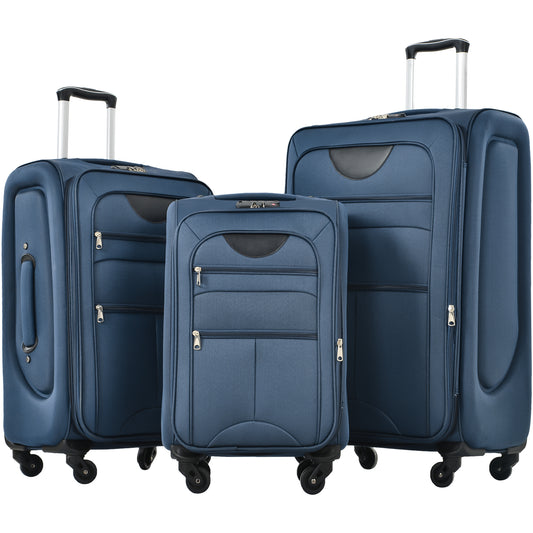 Three navy blue softside luggage pieces with wheels and telescoping handles