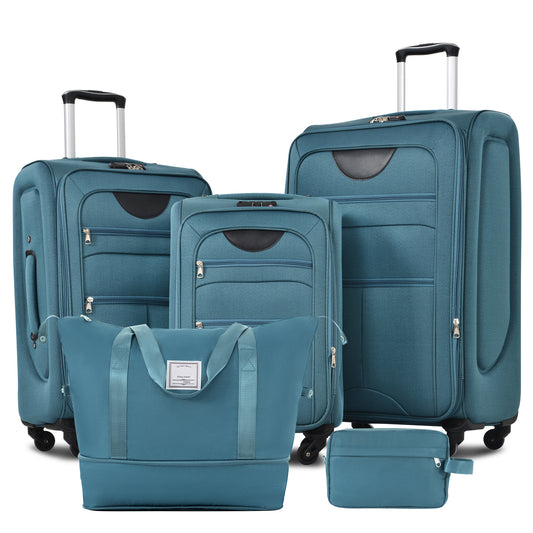 Teal piece luggage set with rolling suitcases and a duffel bag for travel