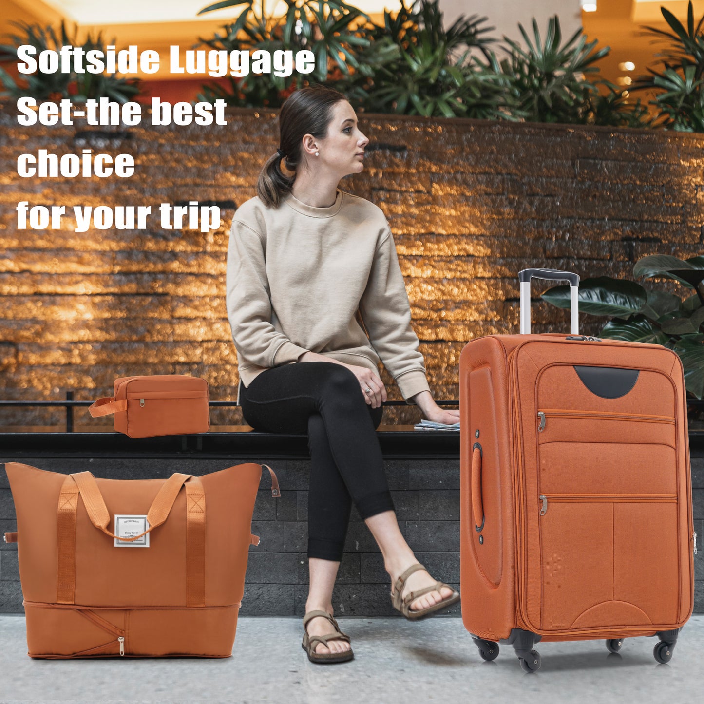 Orange softside spinner luggage with expandable compartments ideal for travel