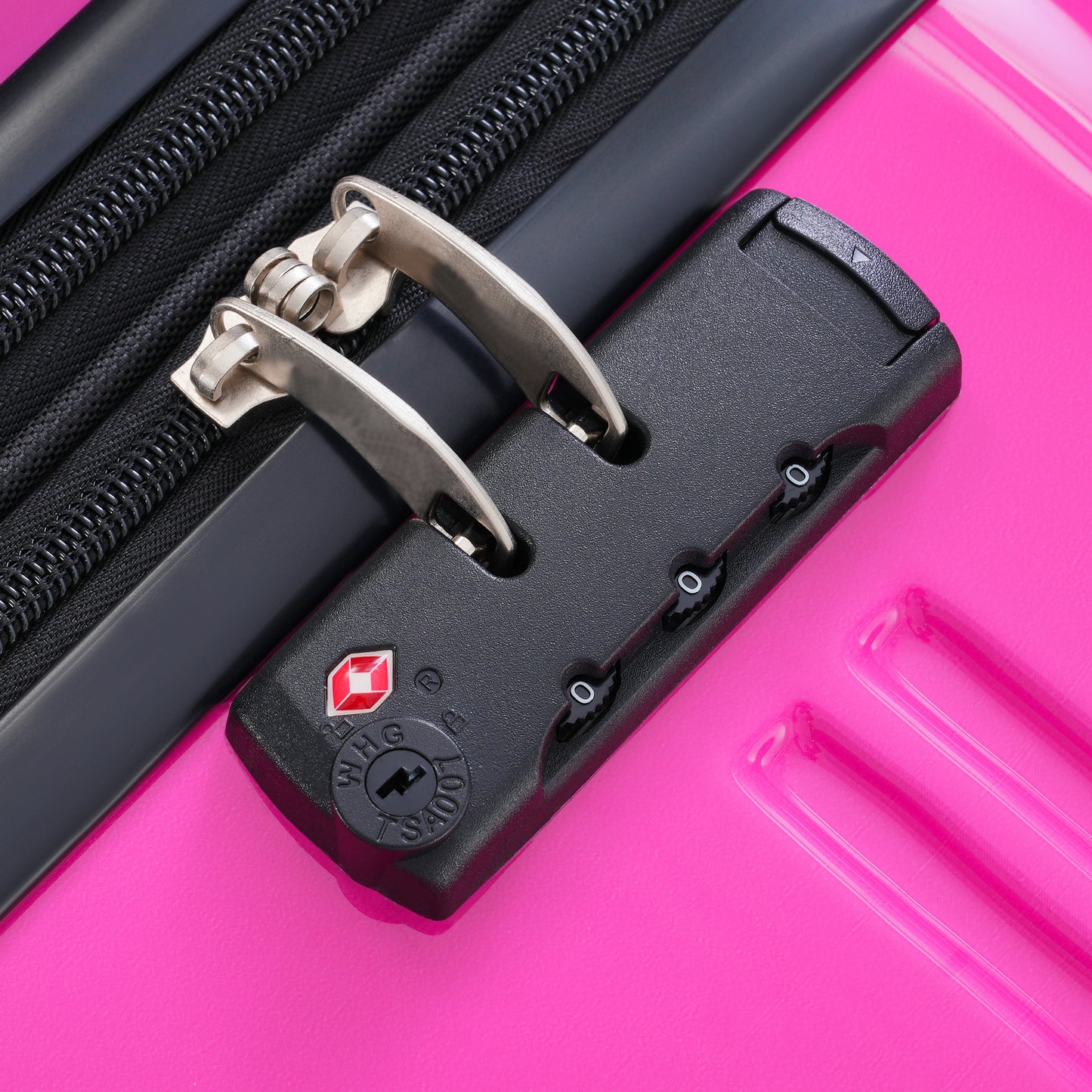 Hot pink luggage with TSA lock and zipper detail