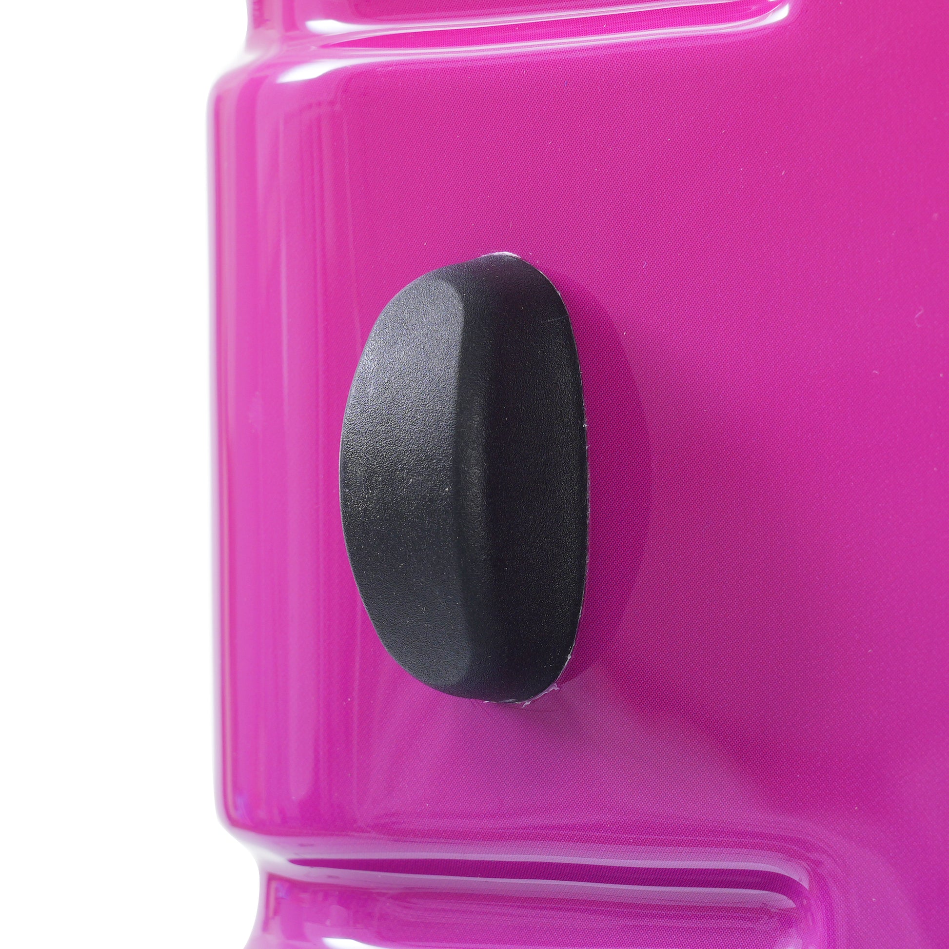 Hot pink hardshell luggage detail featuring a black TSA lock mechanism