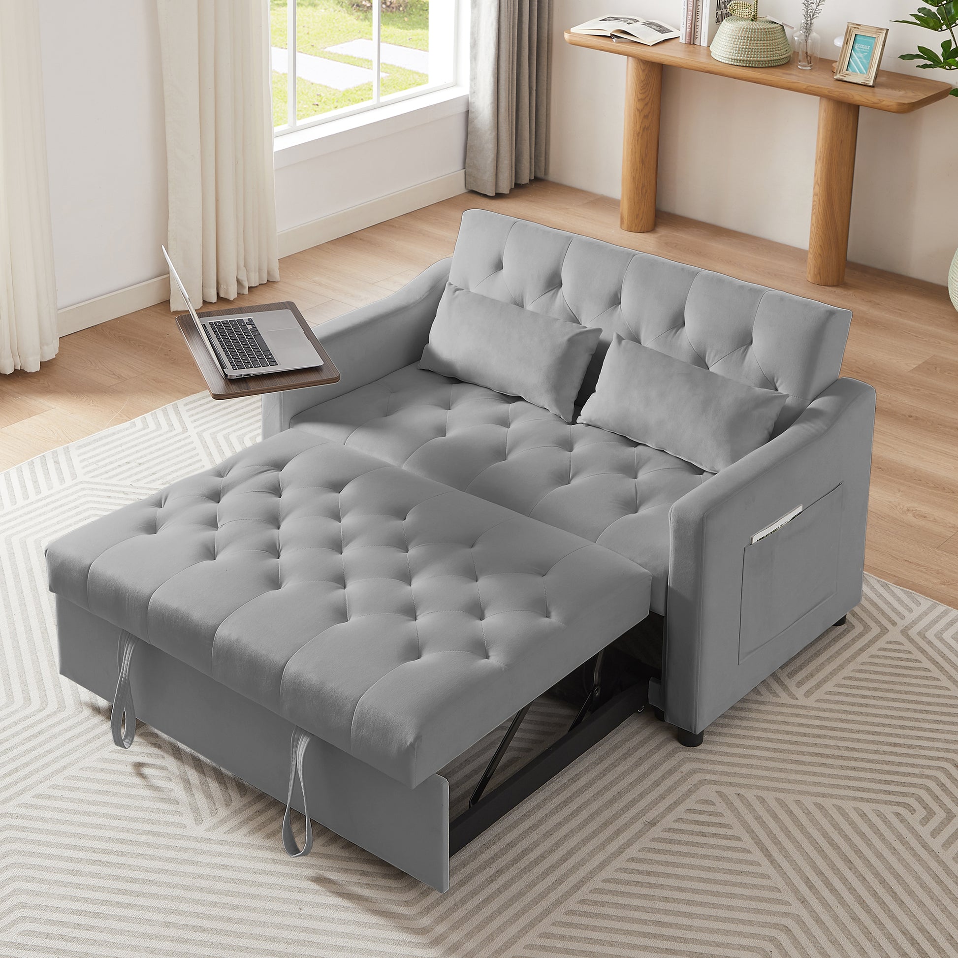 Gray velvet sofa bed with tufted cushions extended chaise for ultimate comfort