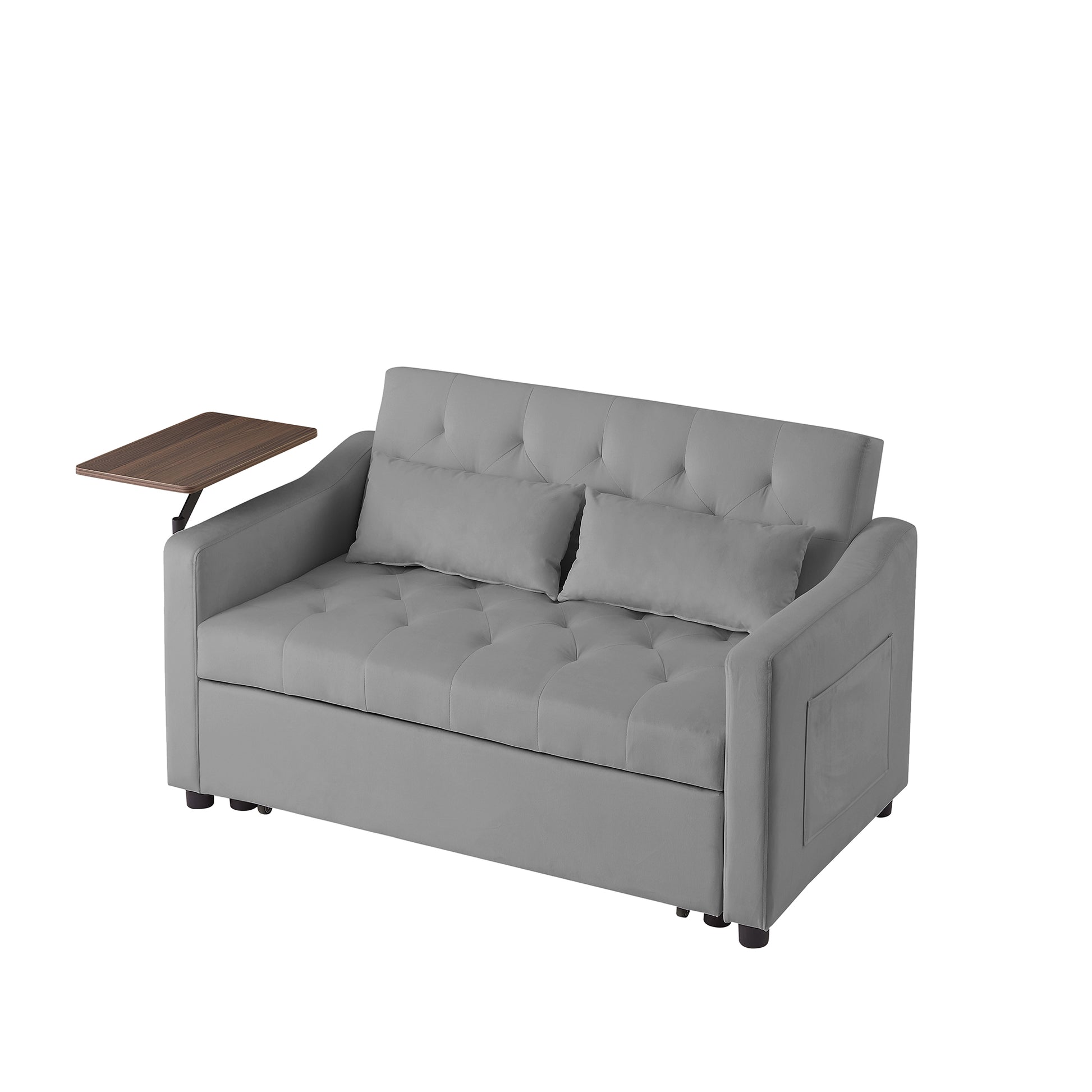 Tufted grey velvet sofa bed with an attached walnut wood tray table for compact living