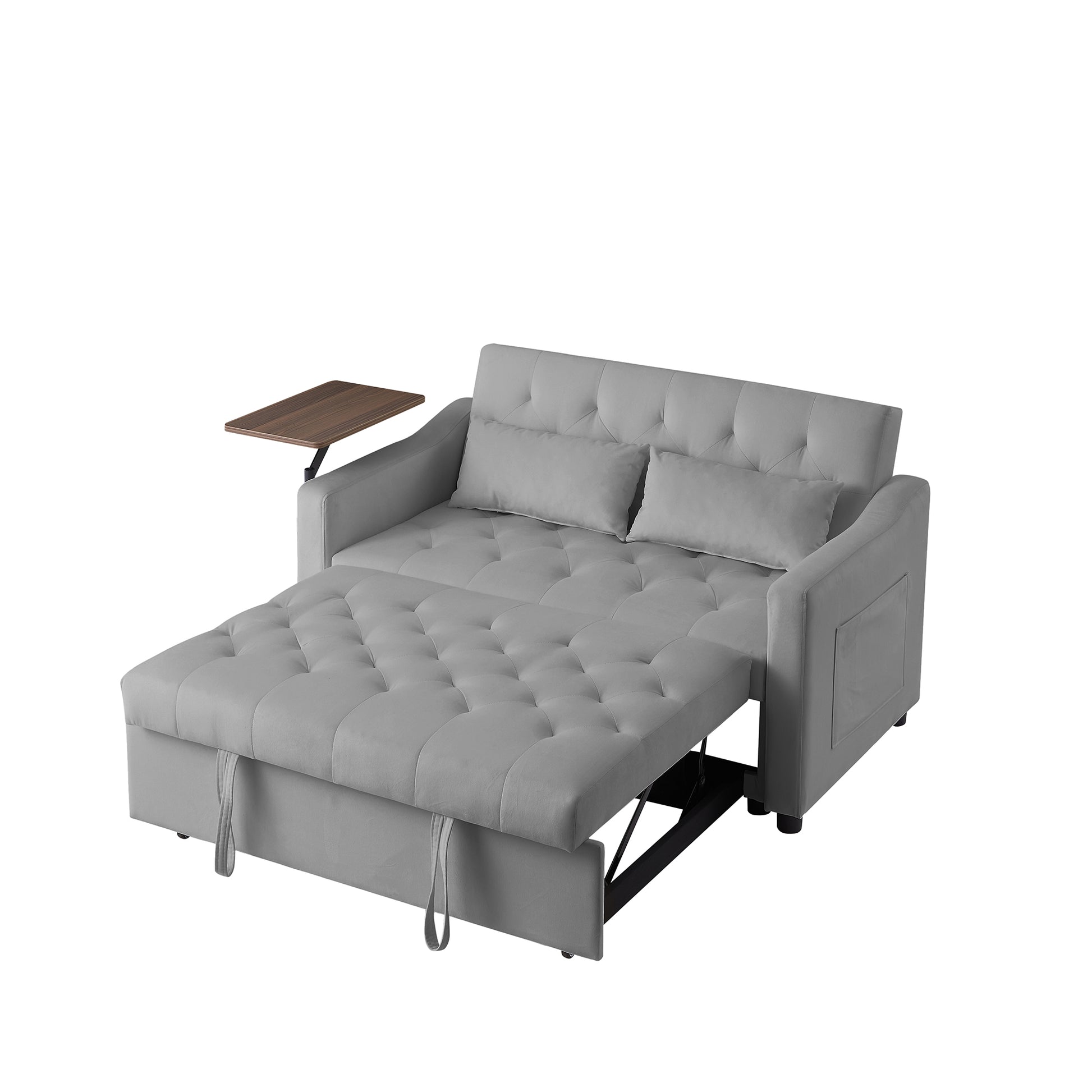 Gray tufted sofa bed with pullout mattress and wooden side tray spacesaving design
