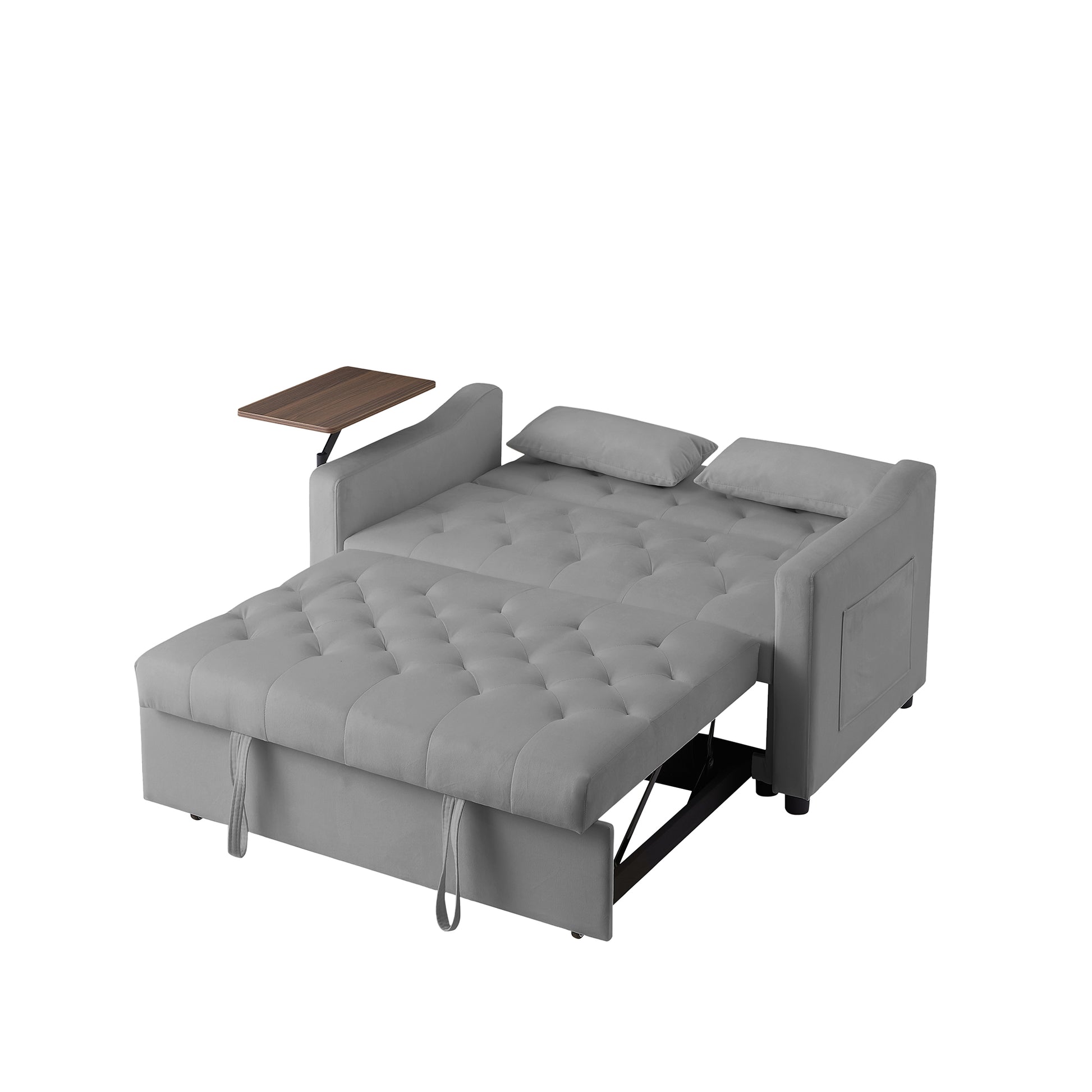 Grey velvet sofa bed with tufted cushions and pullout mattress