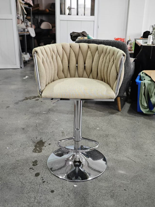 Adjustable beige upholstered bar stool with diamond tufting and chrome base