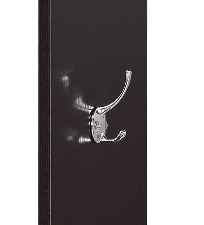 Double robe hook with polished chrome finish on dark wood panel