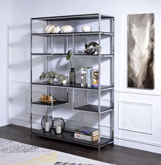 Modern chrome and black bookshelf with staggered shelves displaying decor