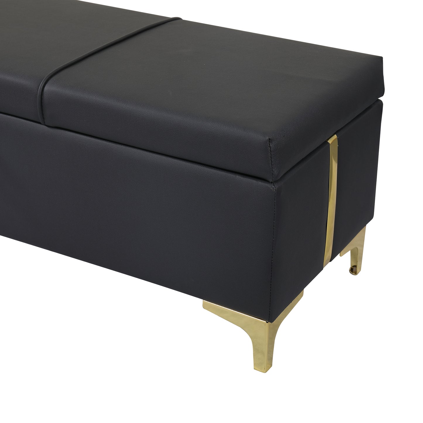 Black faux leather storage ottoman with gold metal legs and accents