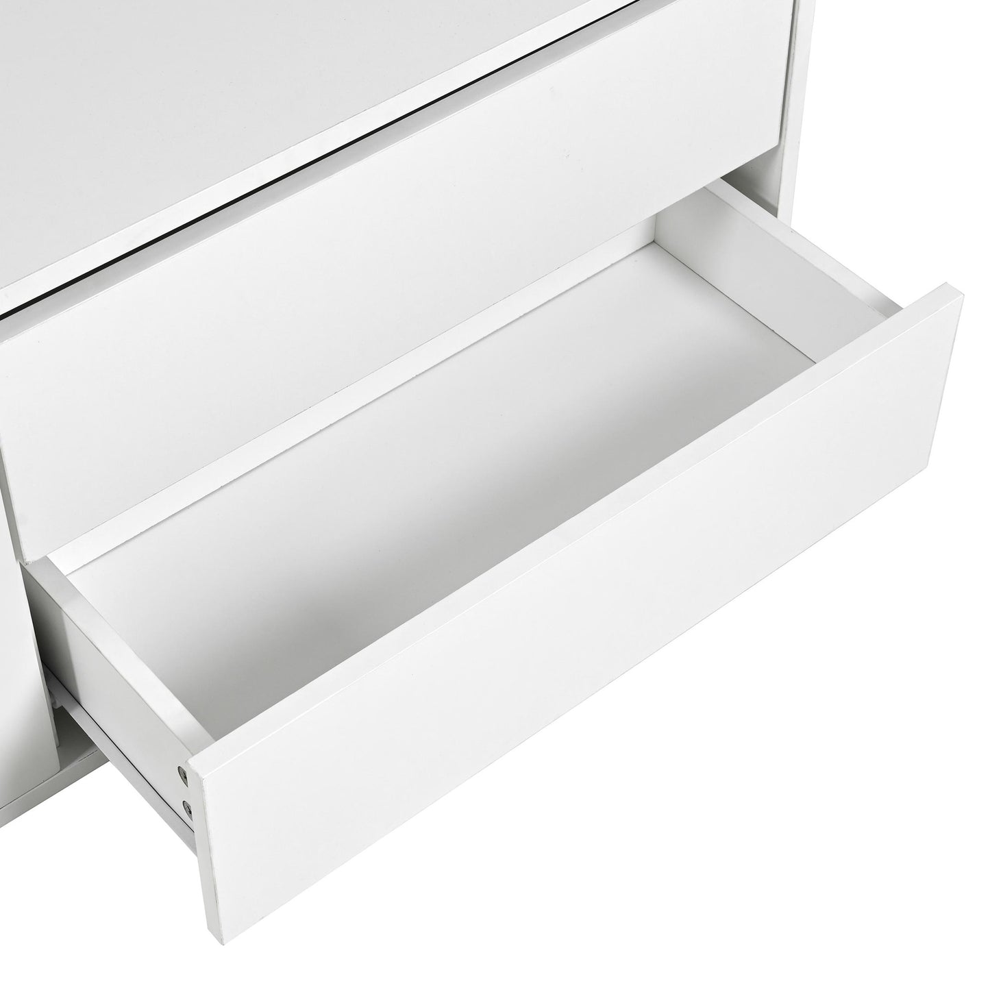 Open white dresser drawer showcasing smooth construction and metal drawer glides for easy access storage