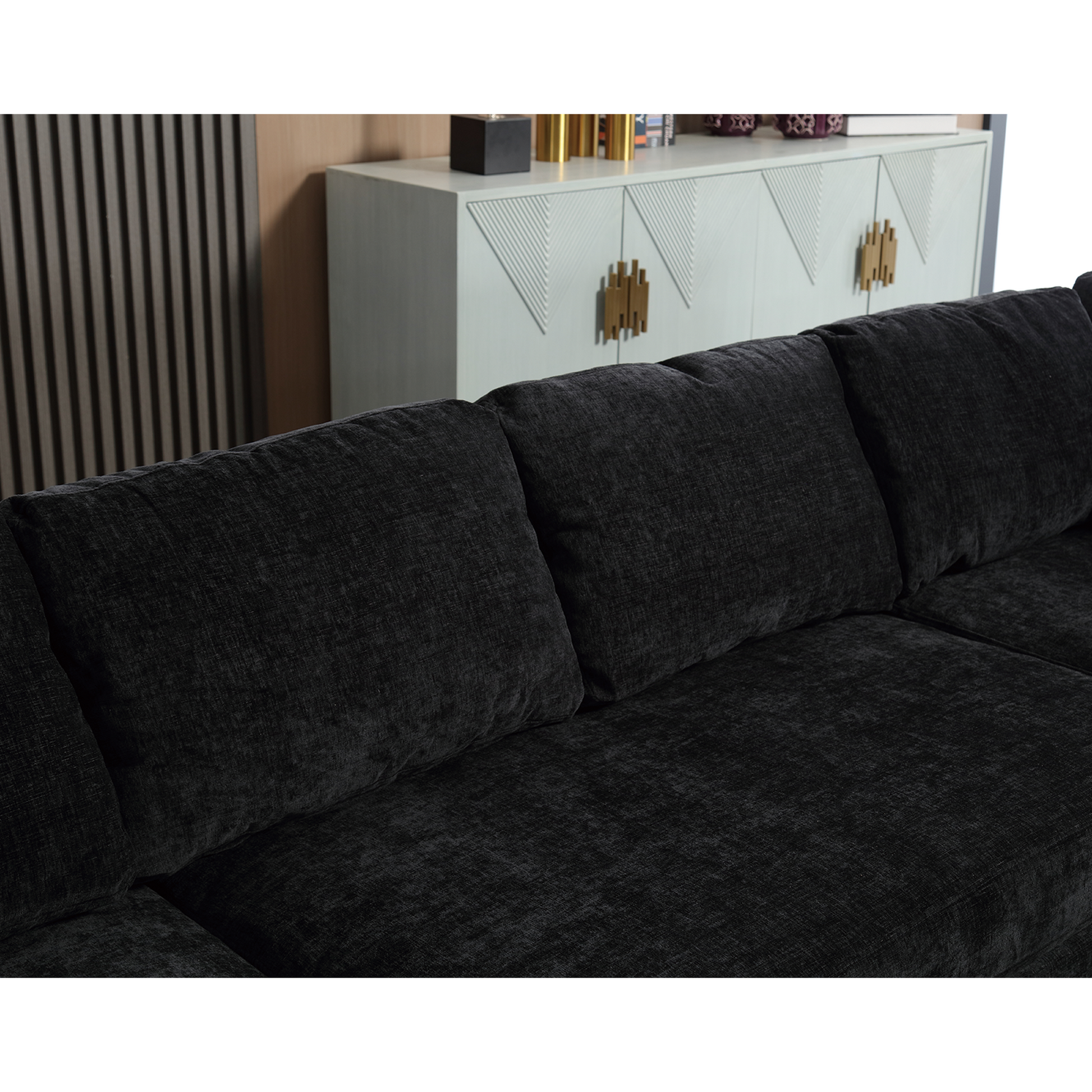 Deep charcoal textured fabric sectional sofa with plush cushions