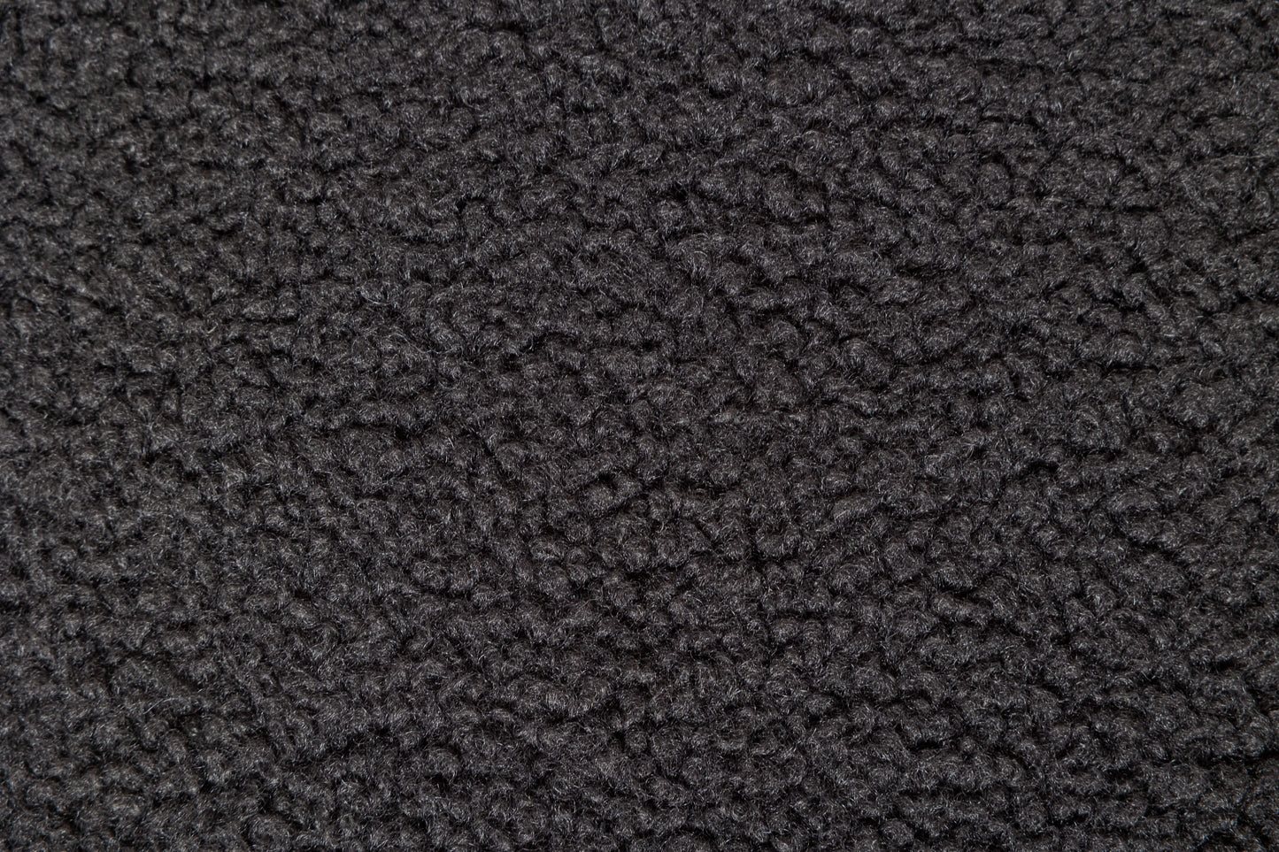 Closeup texture of dark grey fleece fabric soft and fluffy for winter apparel