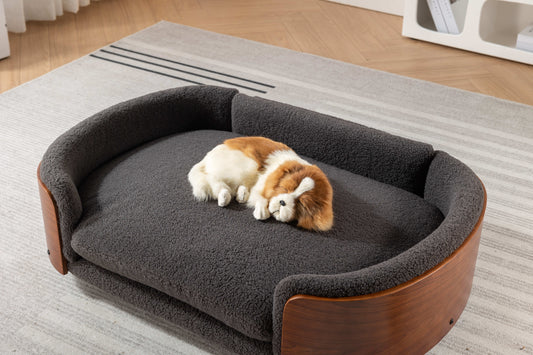 Plush grey pet bed with curved wooden frame featuring a soft cozy interior for ultimate pet comfort