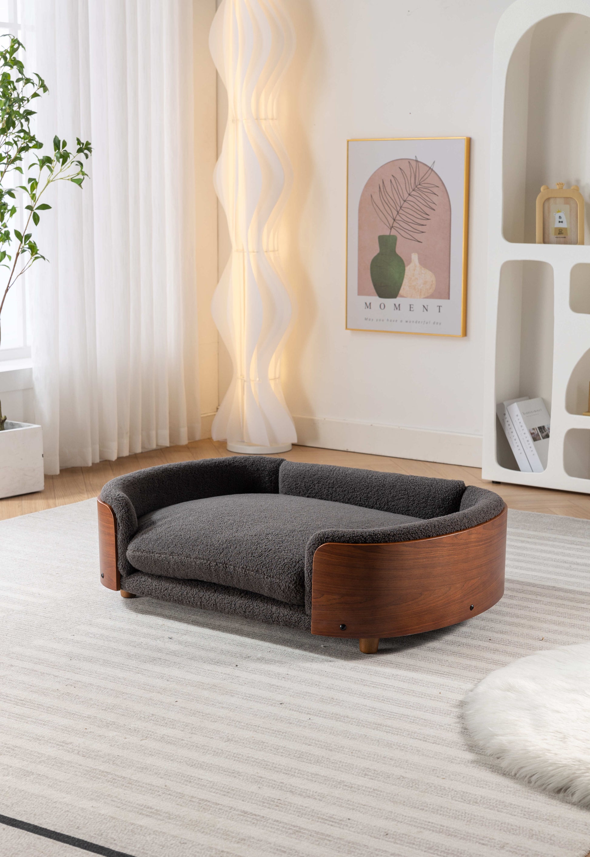 Dark grey fluffy dog bed with curved wooden base
