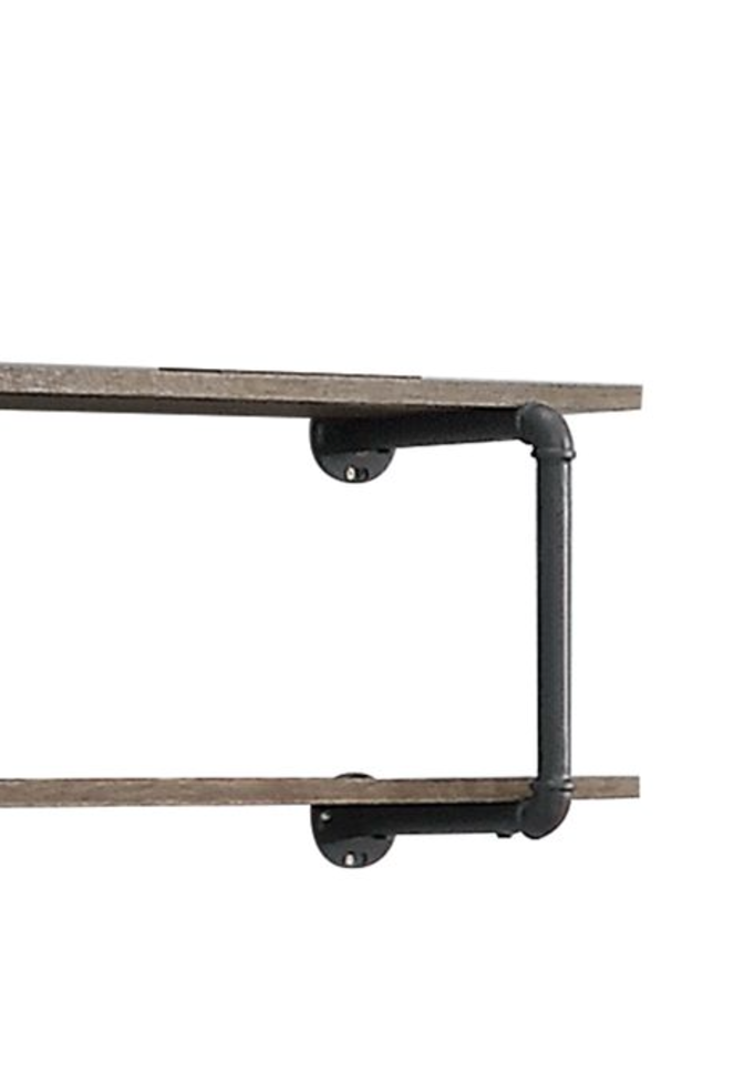 Rustic industrial pipe shelf with weathered wood planks and black pipe brackets