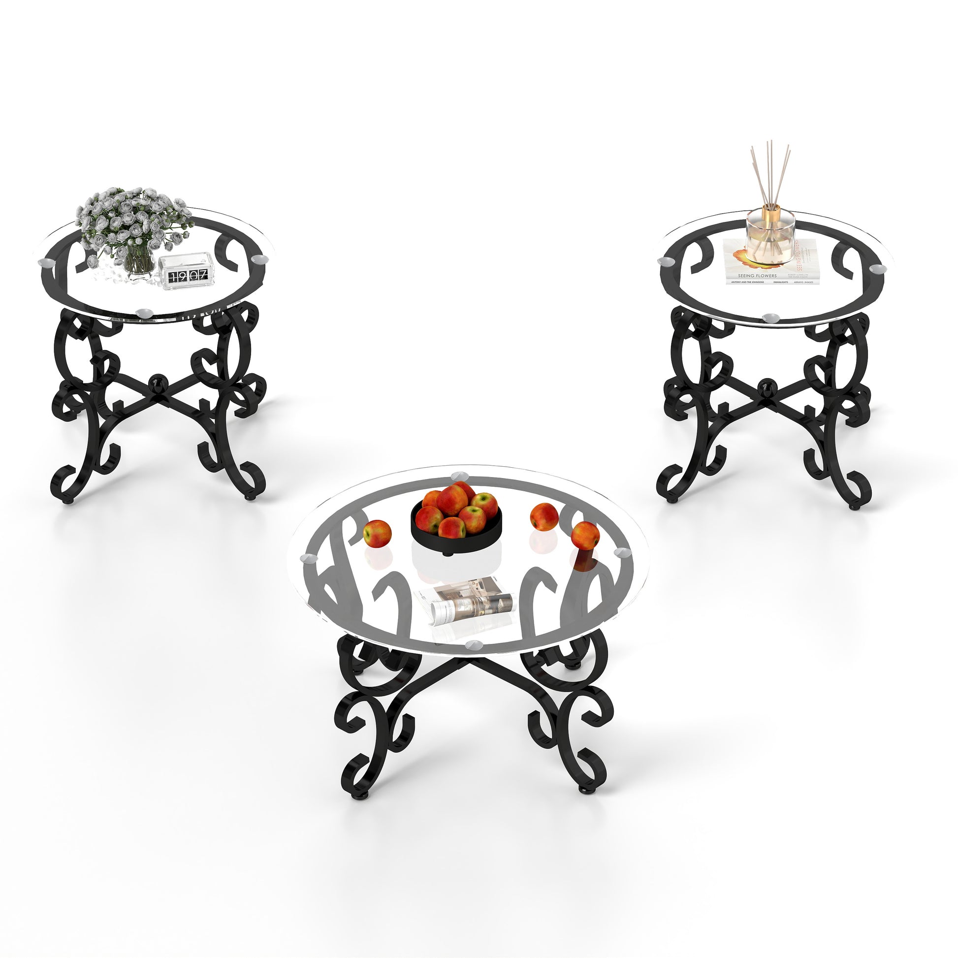 Round glass end table with ornate black metal base and a vase of flowers