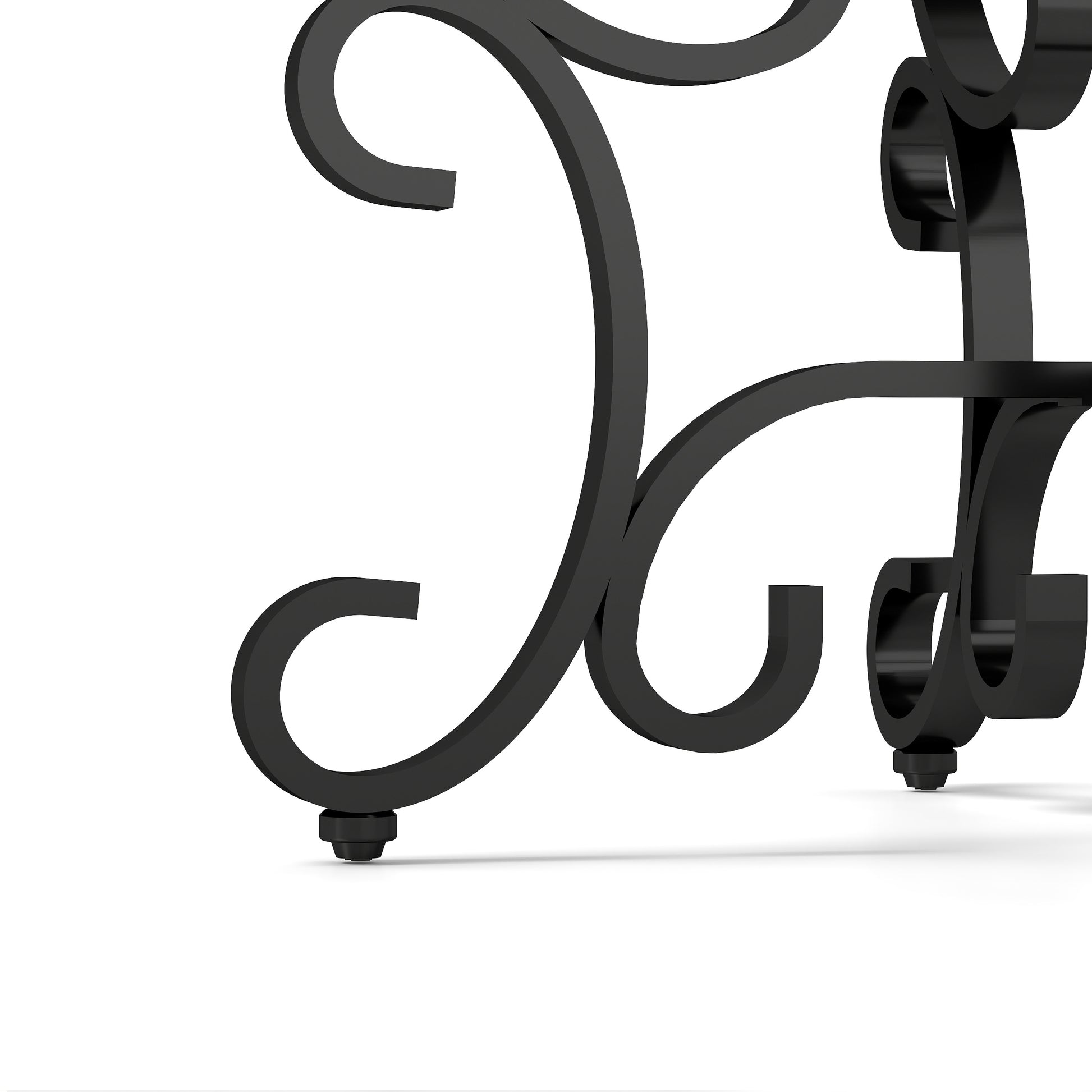 Black wrought iron ornate table leg with scroll details and adjustable feet