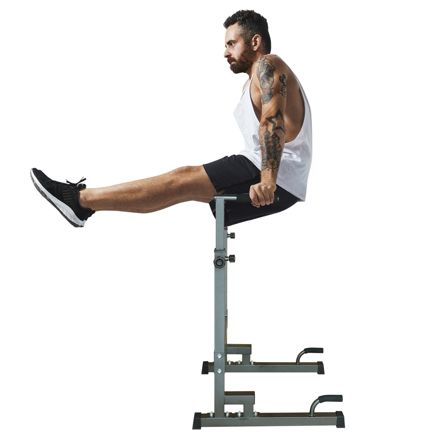 Man performing dips on black adjustable dip station with padded handles