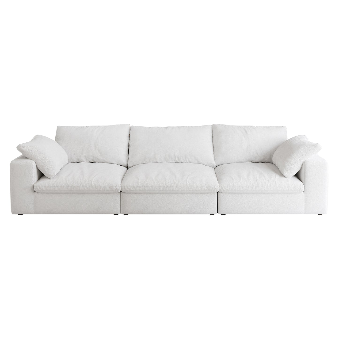Plush white threeseater sectional sofa with deep seating and loose back pillows for ultimate comfort