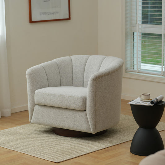 Modern swivel armchair in light grey textured fabric with fluted back detail