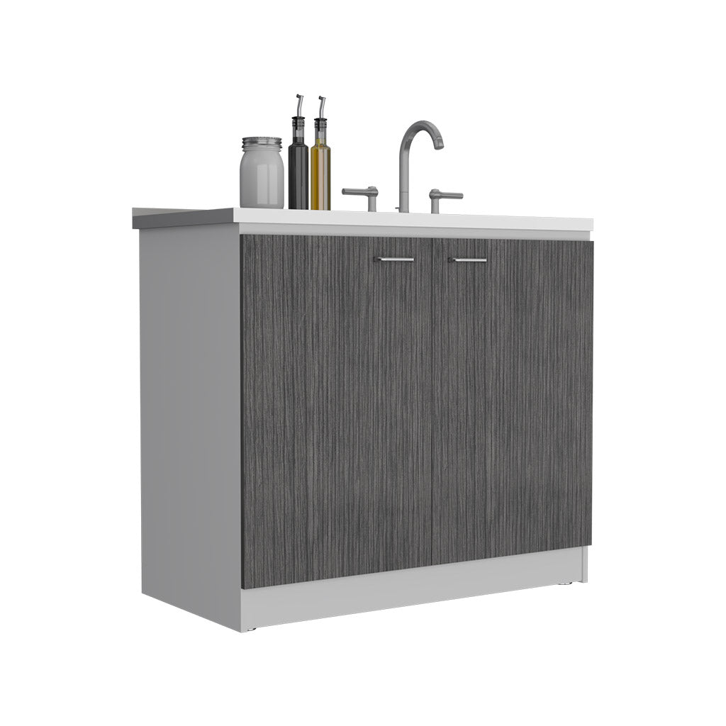 Gray wood grain cabinet with white countertop and silver faucet perfect for a modern kitchen setup
