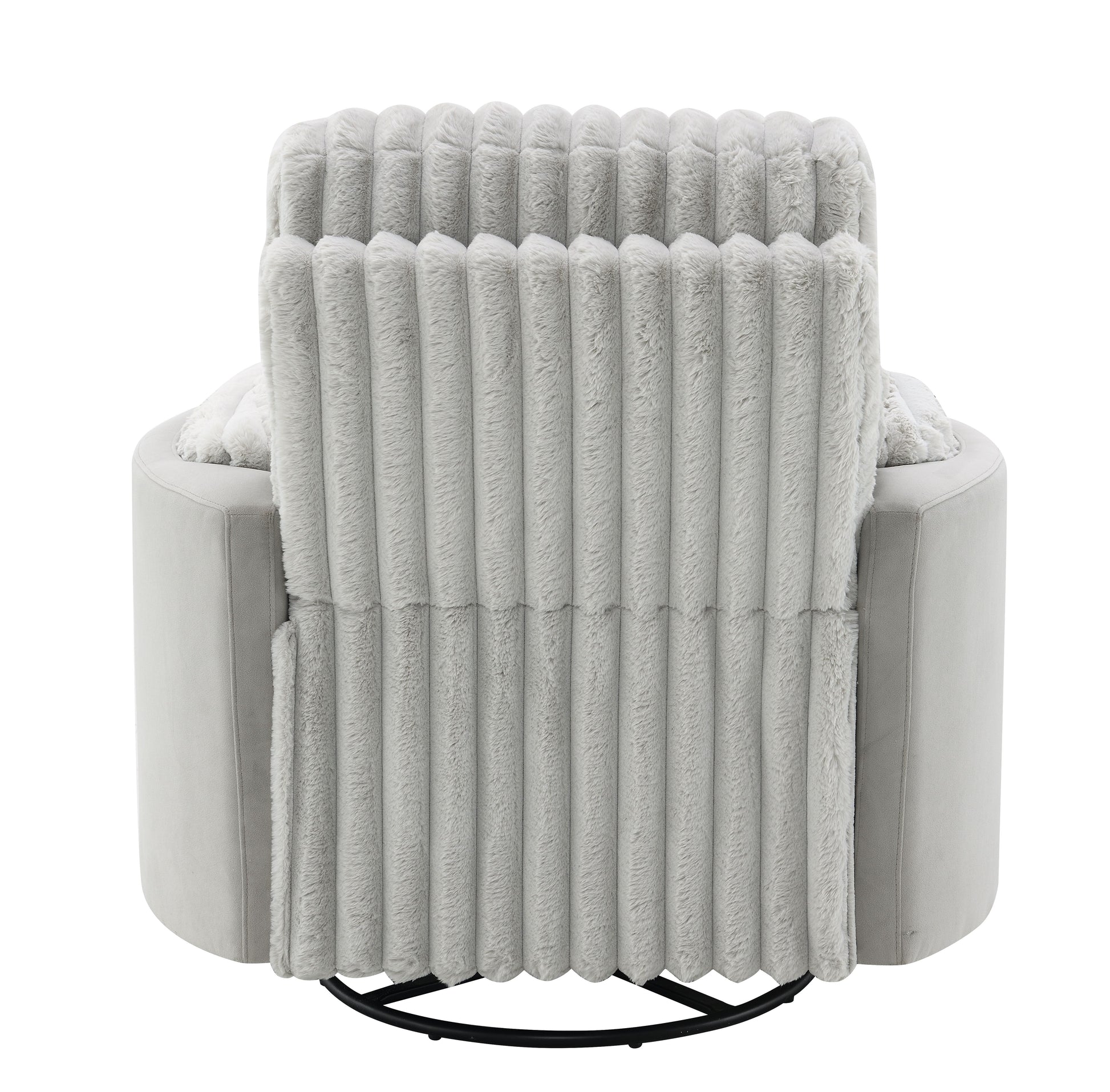 Plush gray swivel chair with channeled back and faux fur throw for cozy living room relaxation