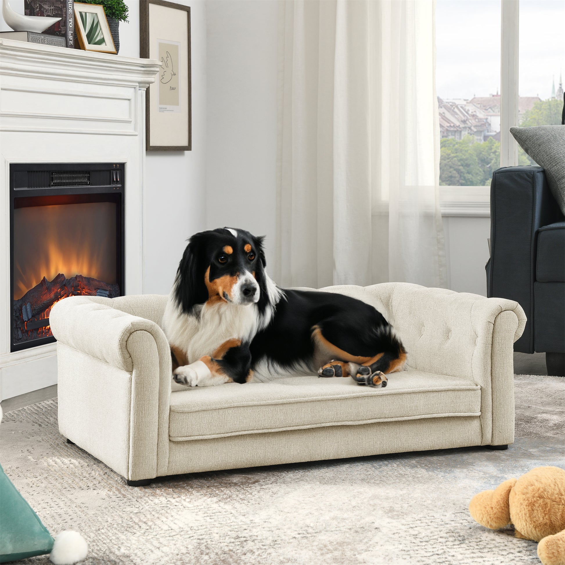 Beige tufted pet sofa with a dog resting comfortably on it