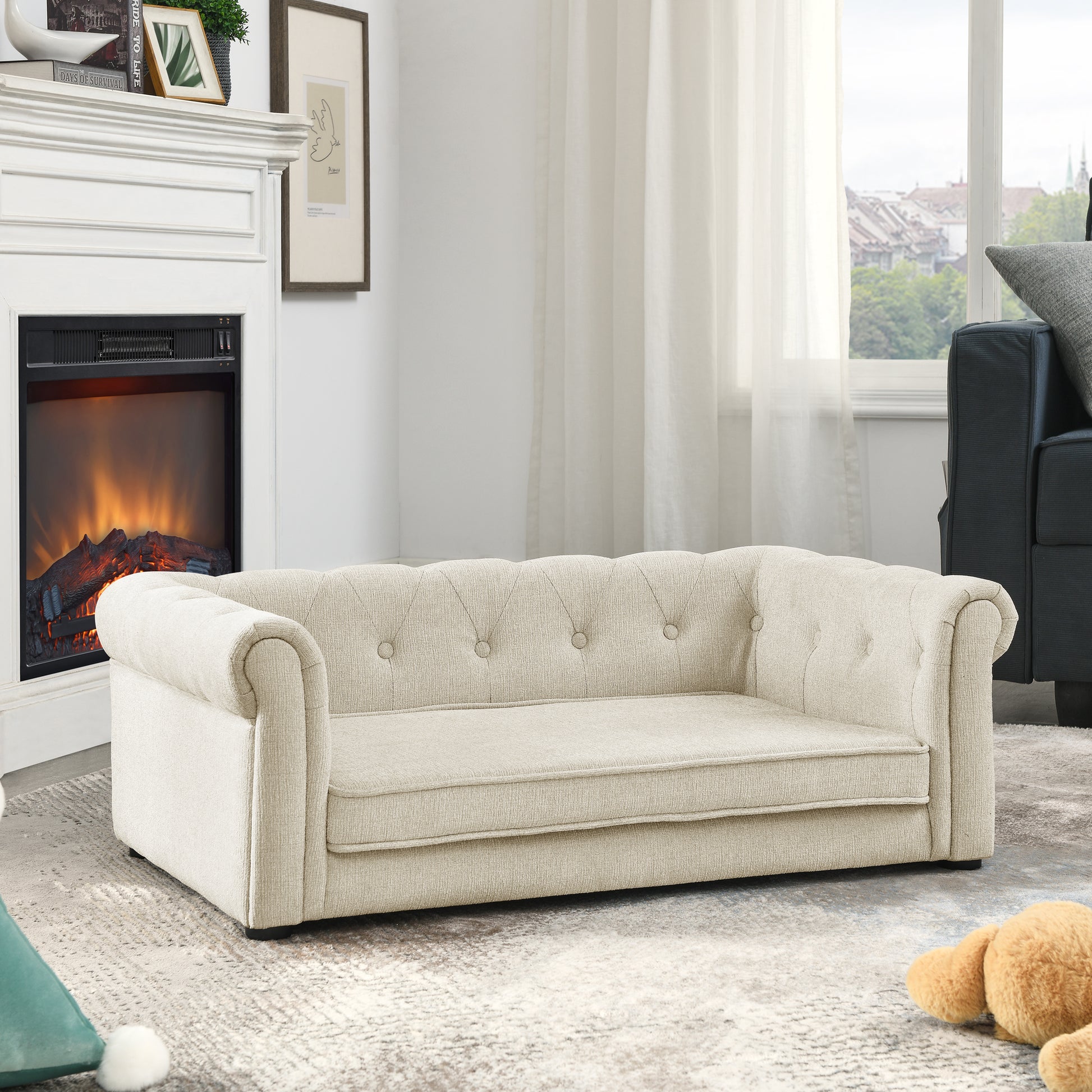 Cream tufted linen dog sofa with rolled arms and button tufts