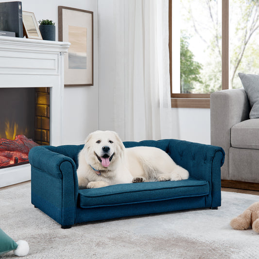 Blue tufted dog sofa with rolled arms and comfortable cushion for a luxurious pet bed