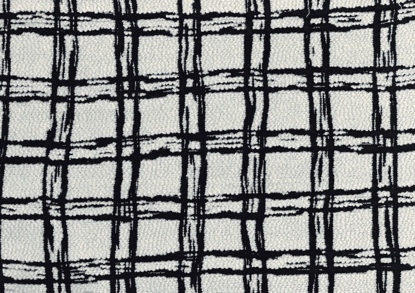 Textured white fabric with a bold black plaid pattern ideal for upholstery