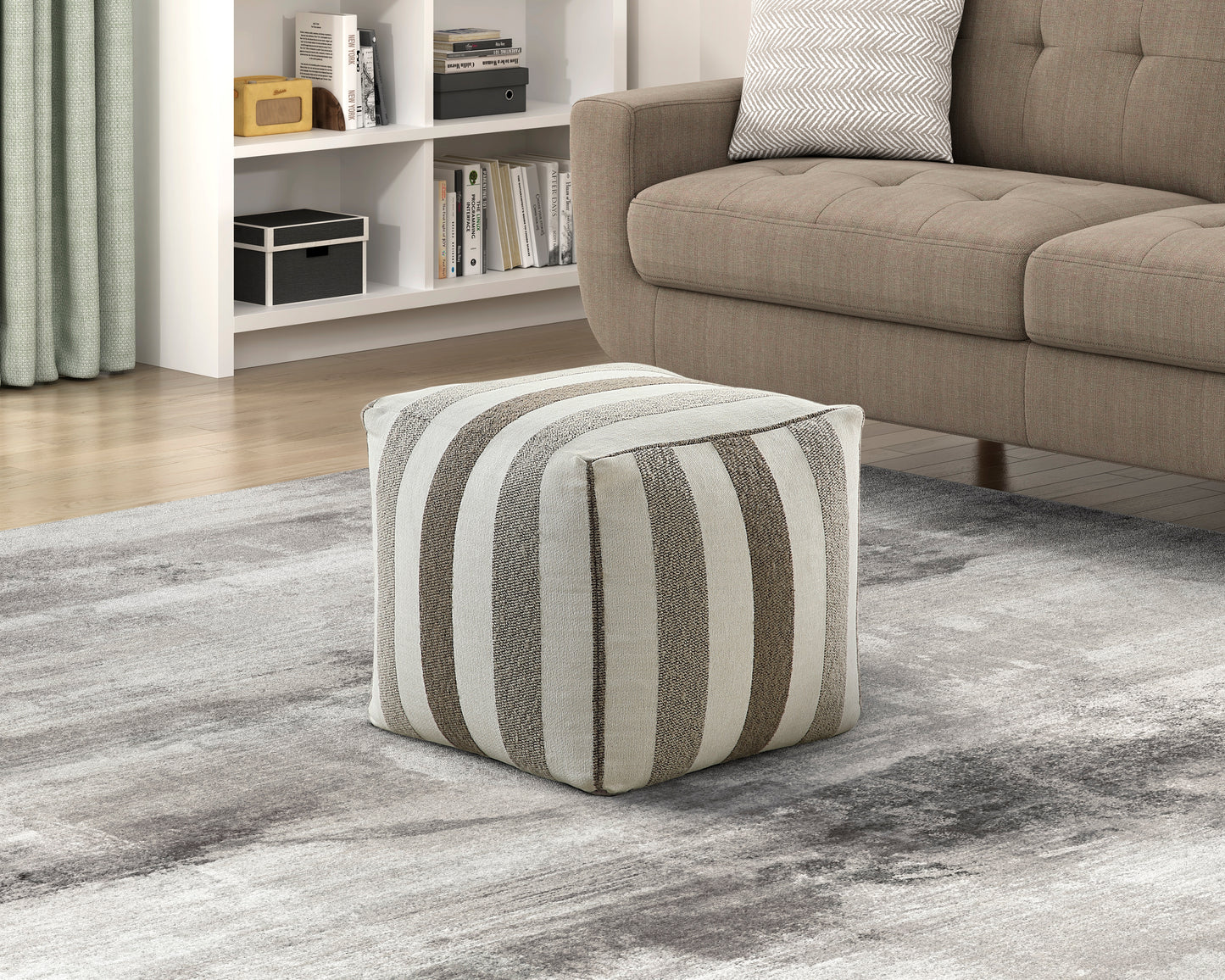 Striped cube ottoman with beige and brown upholstery perfect for a modern living room