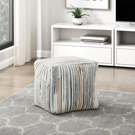 Textured cube ottoman with vertical black and orange stripes on cream background