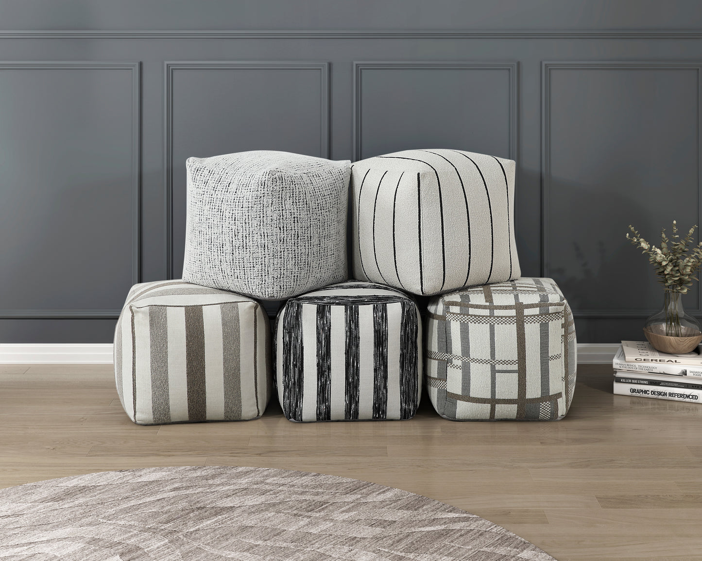 Textured grey and white woven ottoman for a modern living room
