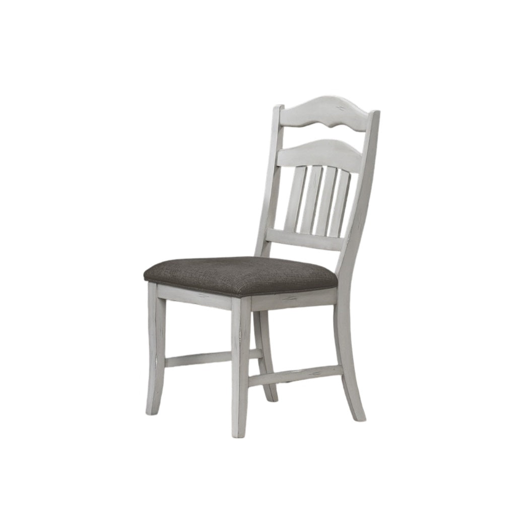 Rustic white wooden dining chair with dark grey upholstered seat