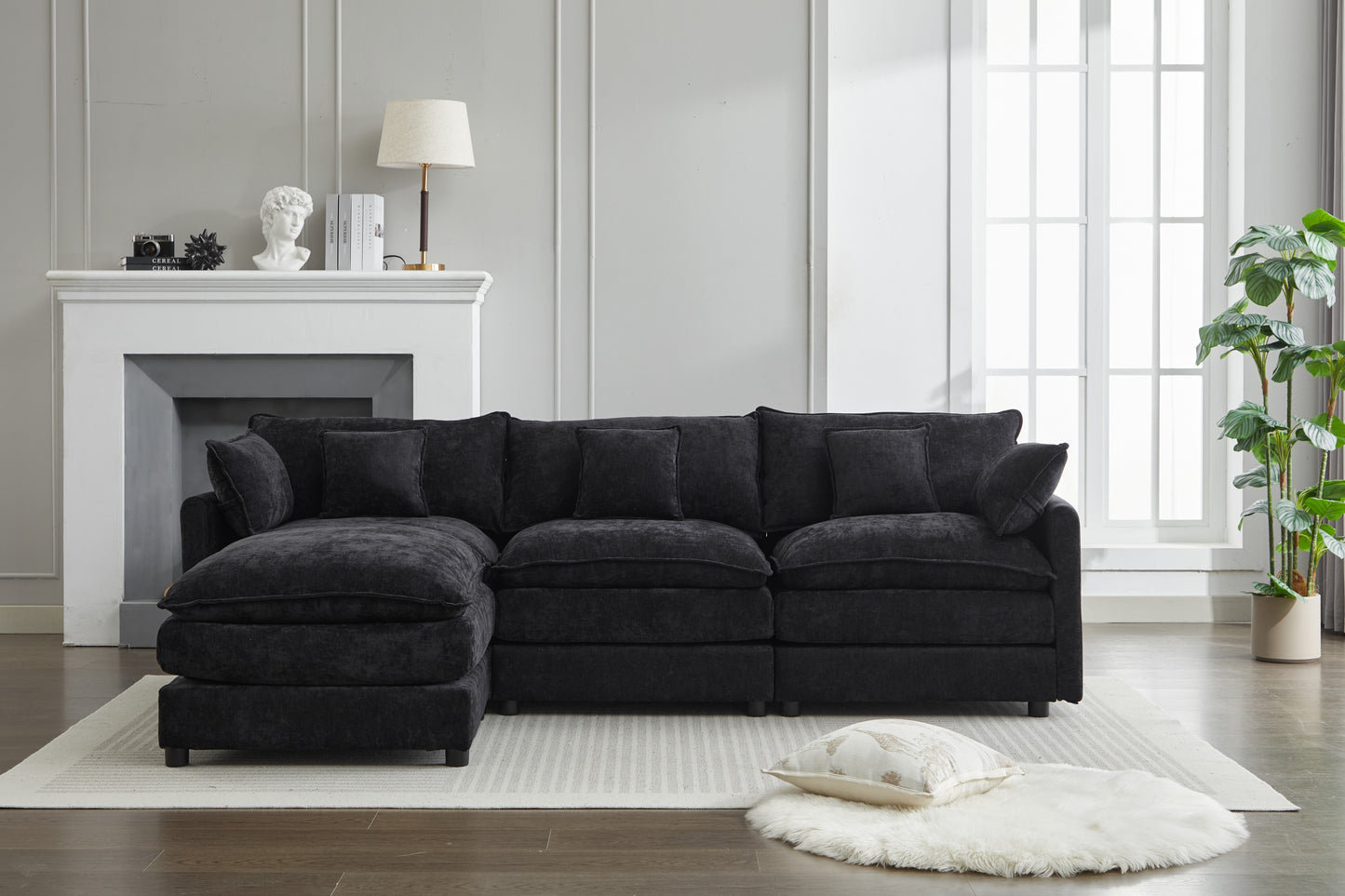 Plush charcoal sectional sofa with deep cushions and reversible chaise for modern living room comfort