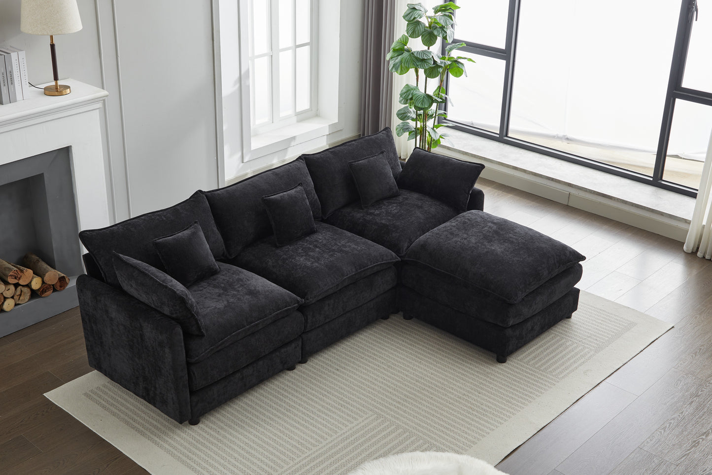 Spacious sectional sofa in dark charcoal fabric with plush cushions perfect for modern living rooms