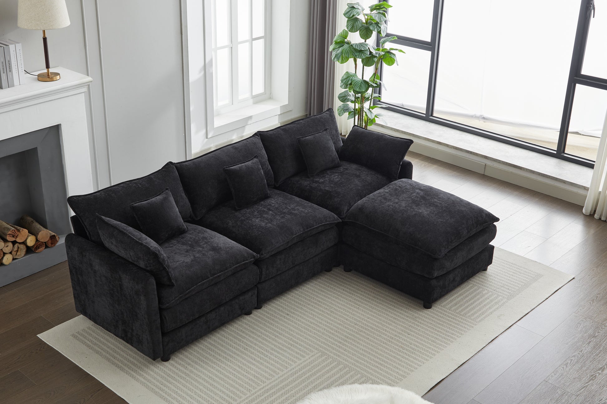 Spacious sectional sofa in dark charcoal fabric with plush cushions perfect for modern living rooms
