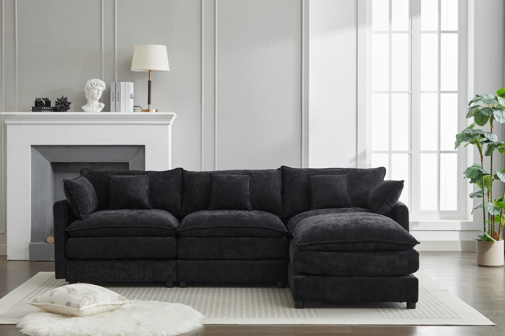 Plush charcoal gray sectional sofa with deep seating and chaise lounge