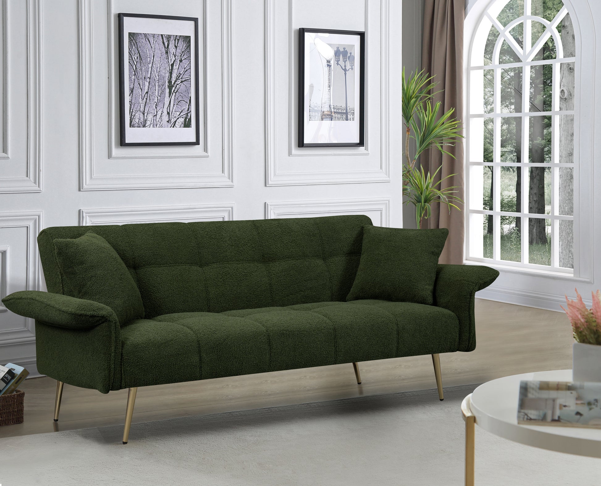 Deep green textured sofa with tufted back and gold legs