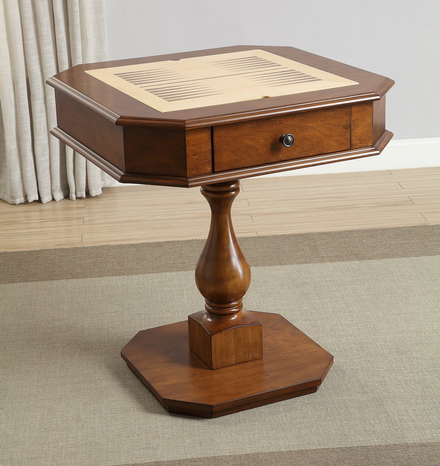 Octagonal wooden game table with inlaid backgammon board and single drawer
