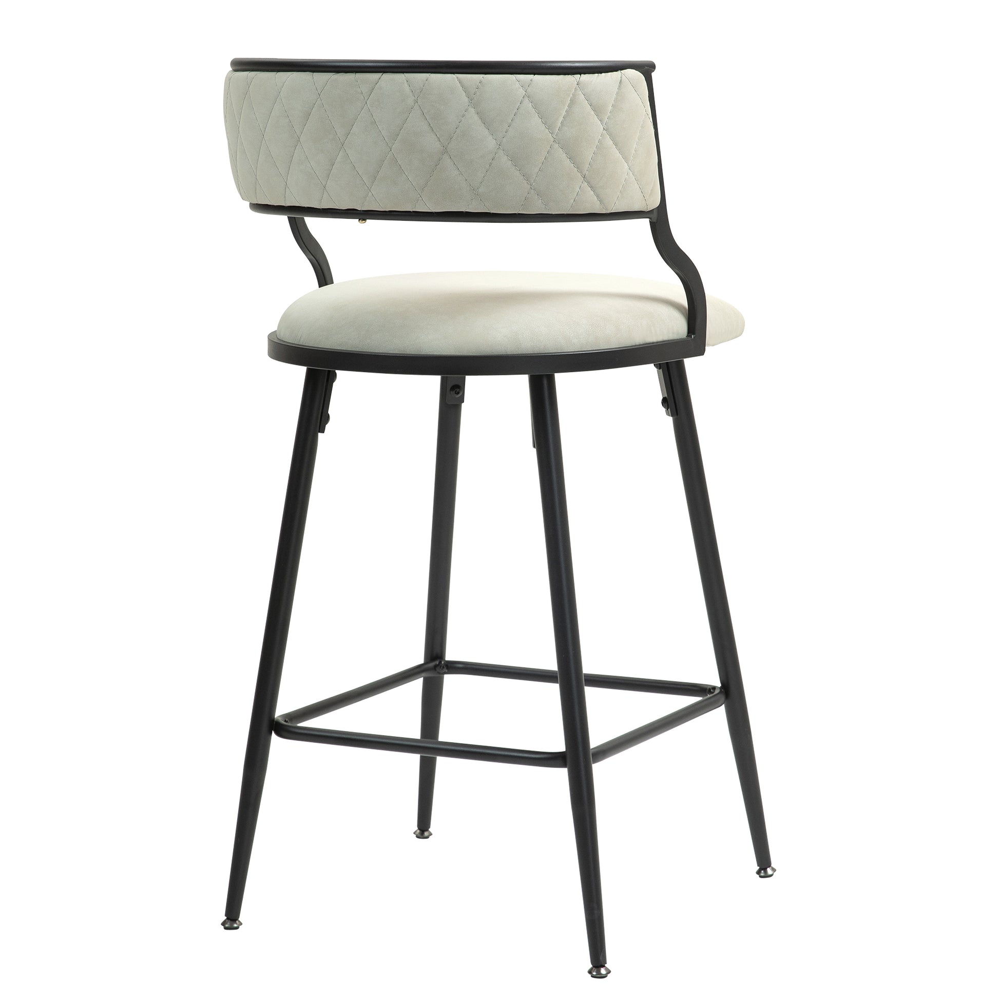 Cream upholstered bar stool with diamond tufting on the back and black metal legs
