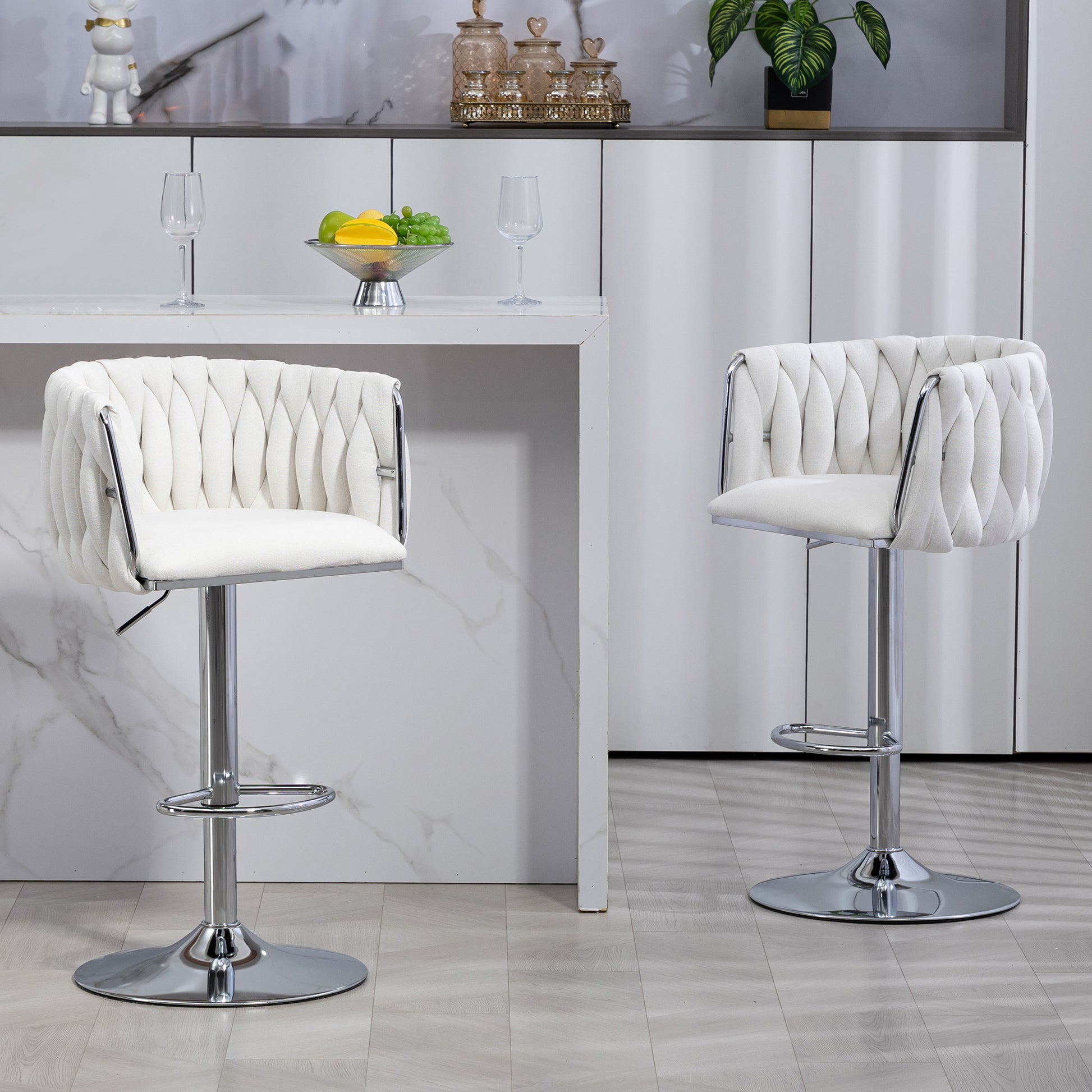 White velvet tufted bar stool with chrome base perfect for kitchen islands
