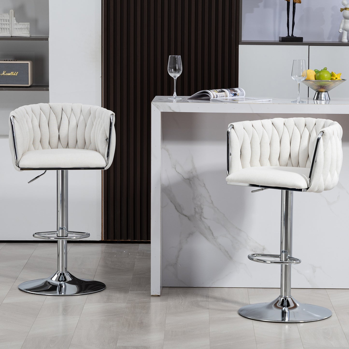 Plush white upholstered bar stool with tufted detailing and chrome accents