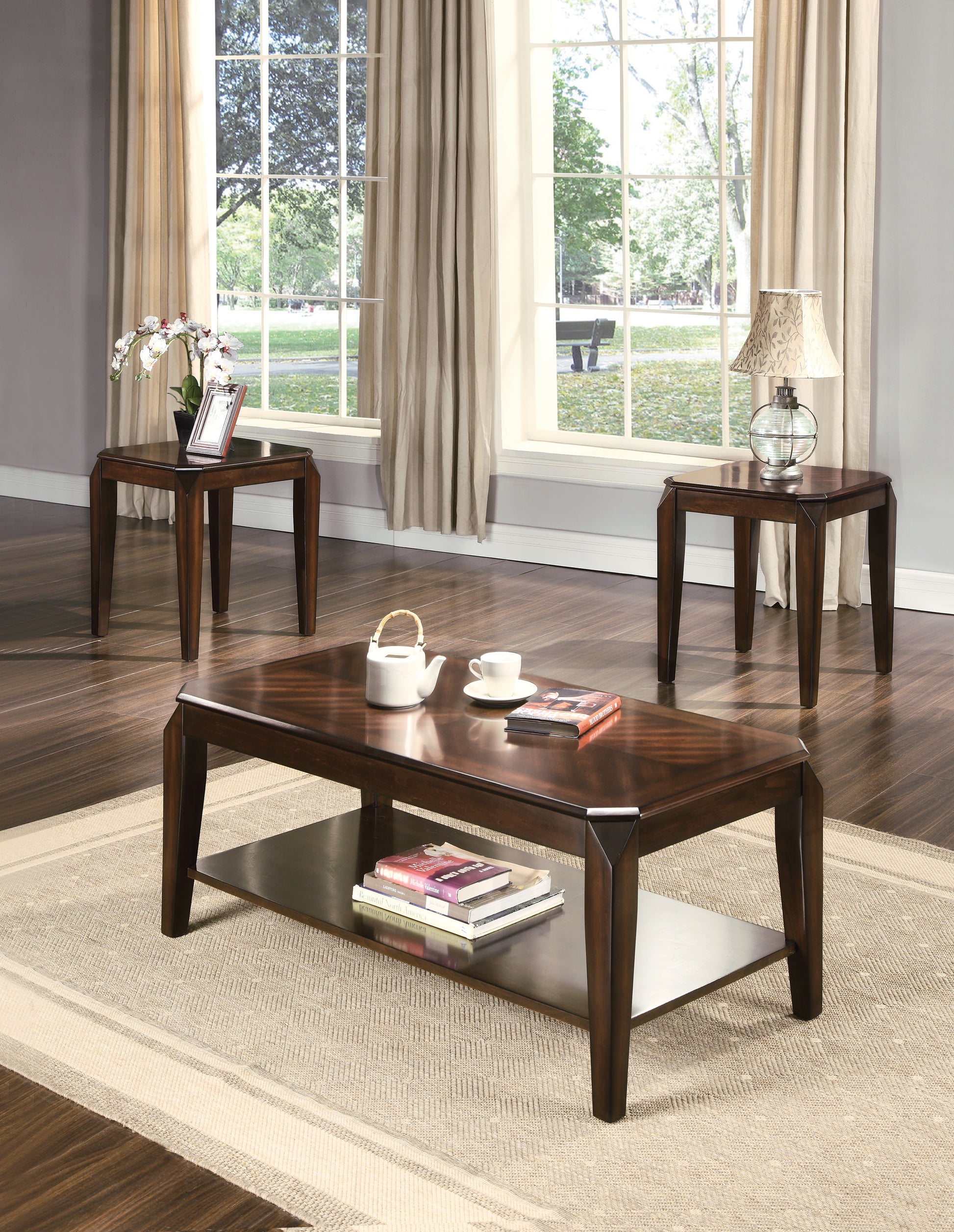 Dark brown wooden coffee table with open shelf holding books and magazines