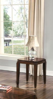 Dark wood end table with lamp featuring a globe base and patterned shade