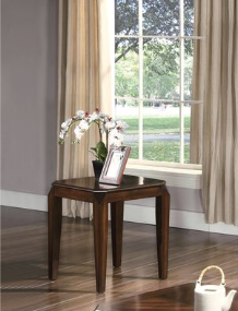 Dark wood accent table with decorative inlay perfect for living rooms