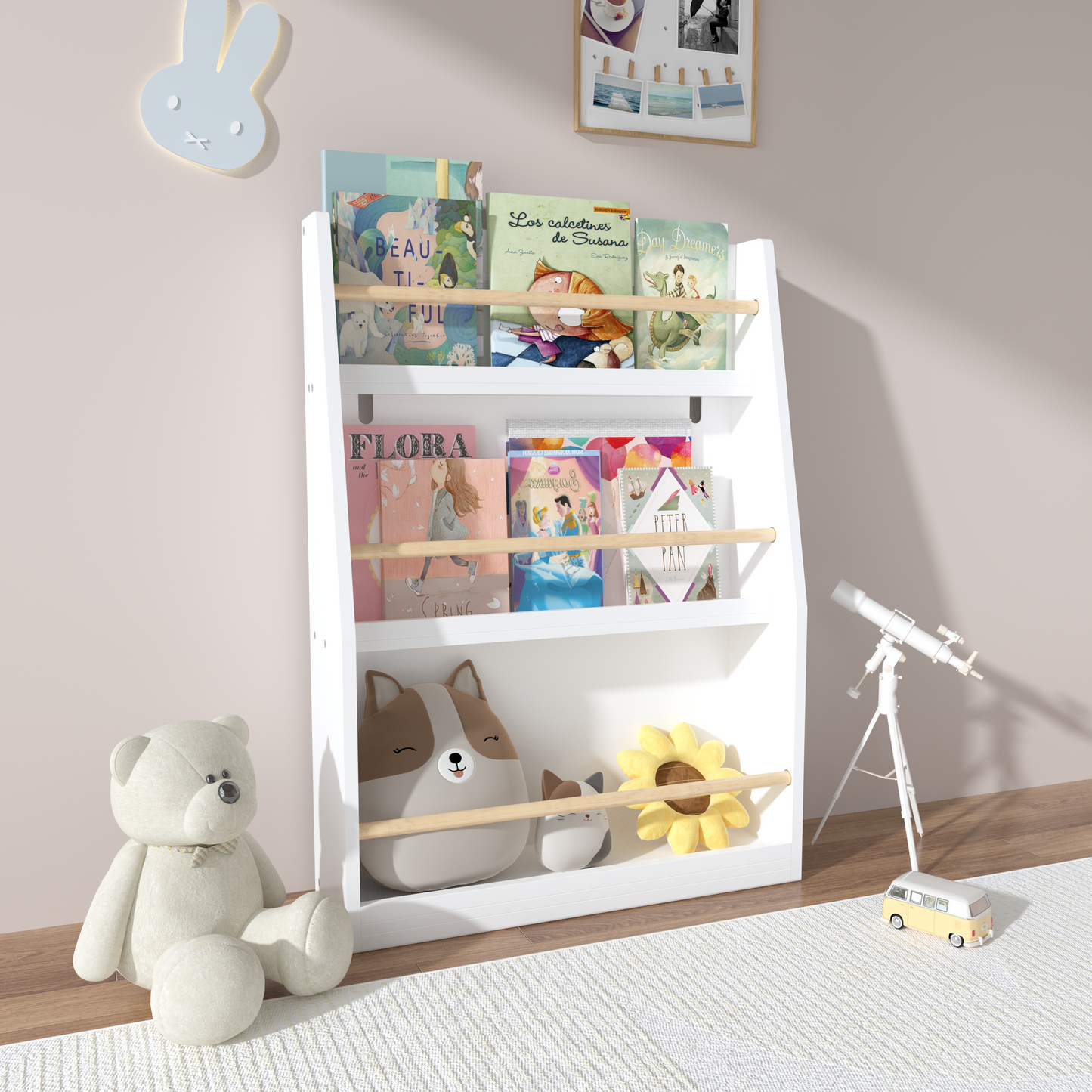 White bookshelf for kids holding colorful storybooks and plush toys